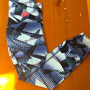 Nike girls patterned blue active wear pants.